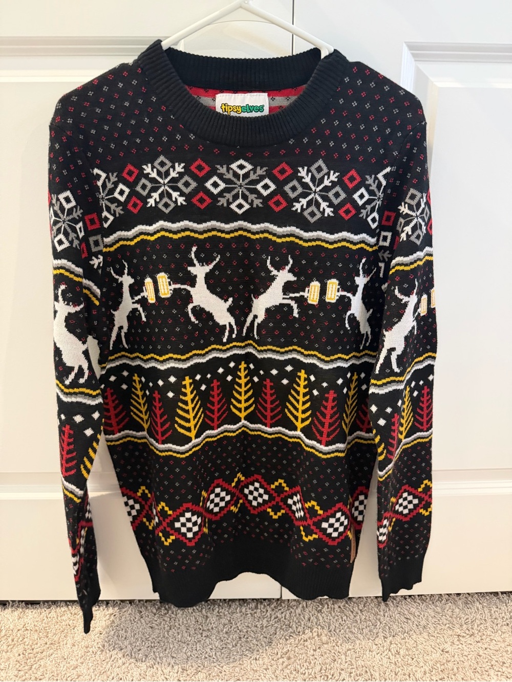 Tipsy Elves Black Crewneck Sweater with Red, White & Yellow Holiday Motif